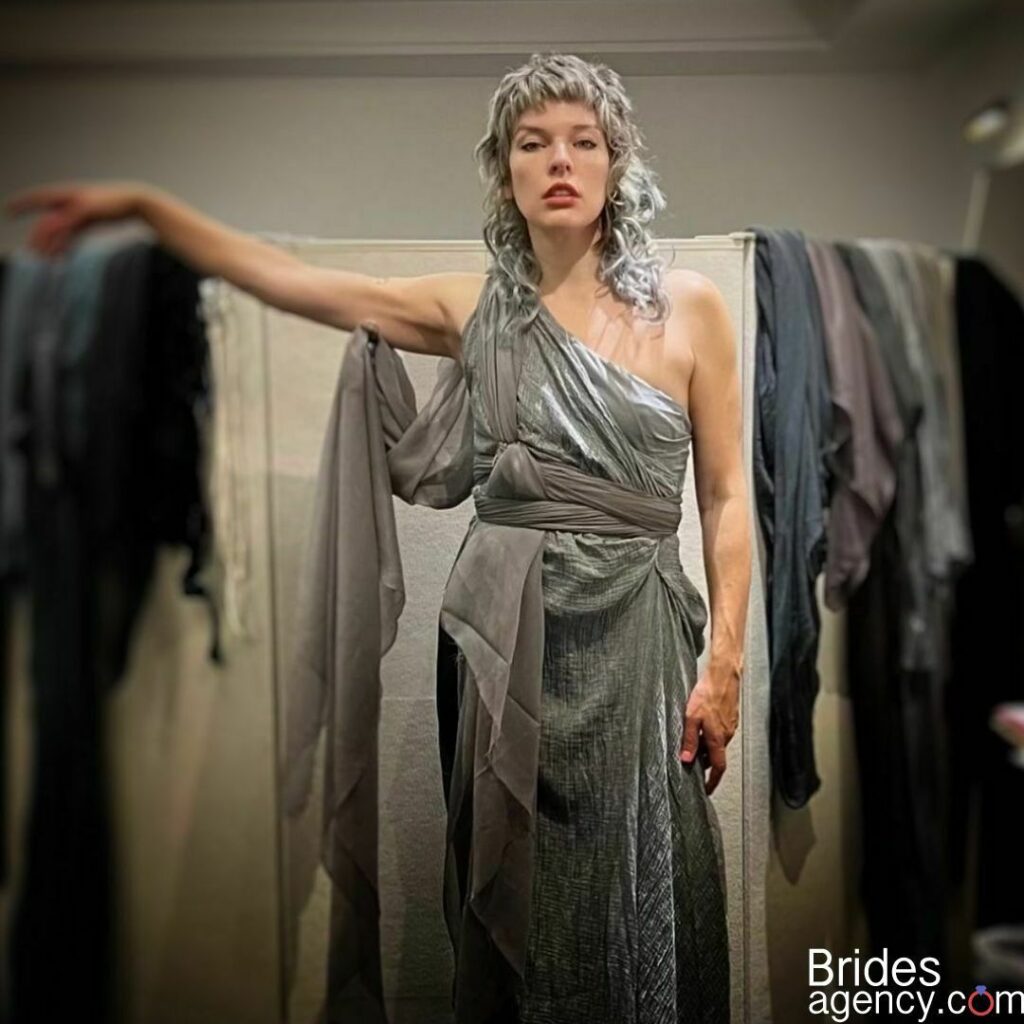 Milla Jovovich in a dress