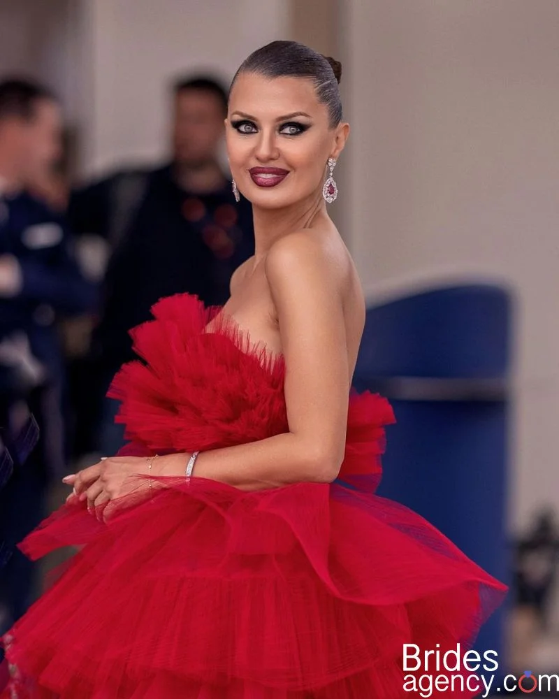Victoria Bonya in a beautiful red dress