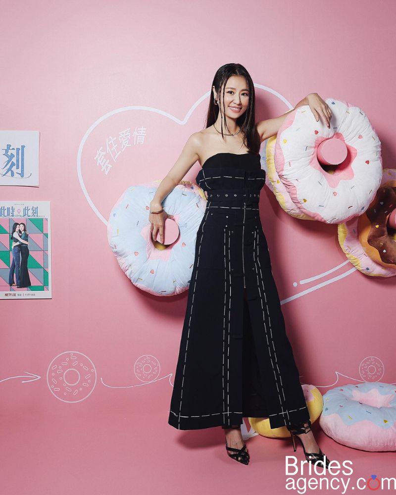 Ruby Lin in a black long dress